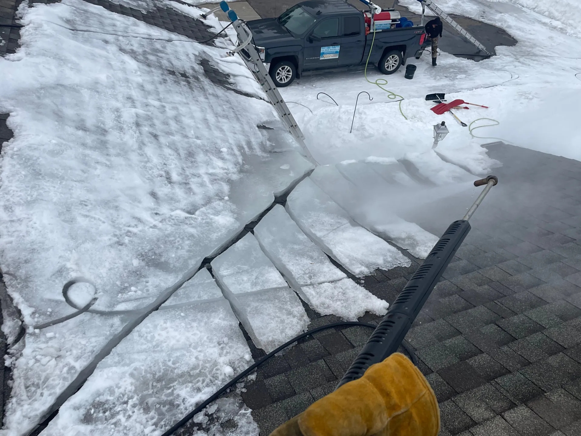 Steam ice dam removal stops roof leaks